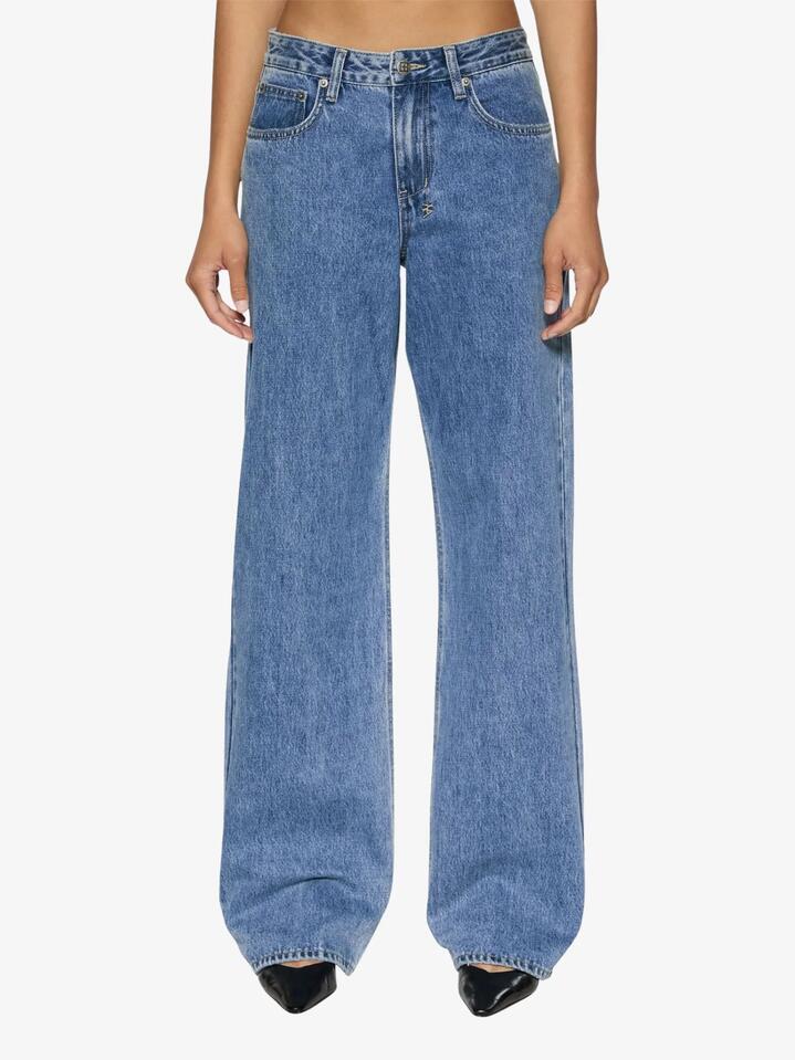Image of a model wearing Denim. Productname: Ksubi Low Rider Heritage Jeans in Denim colour by brand - Ksubi
