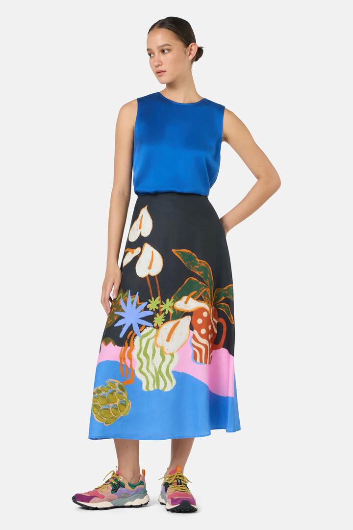 Image of a model wearing Skirts. Product name - Natural Form Midi Skirt in Print colour by brand - Gorman
