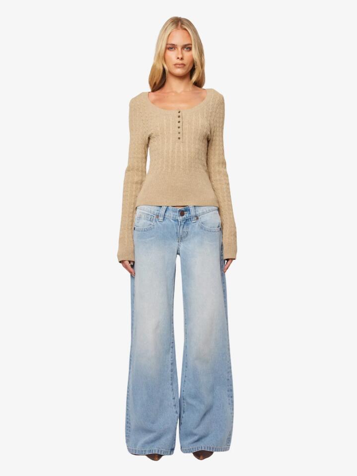 Image of a model wearing Denim. Productname: Abrand 00 Wide Kaia Worn in Kaiaworn colour by brand - Abrand