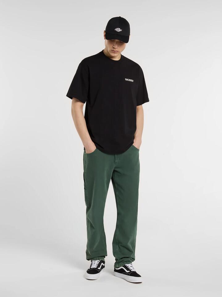 Image of a model wearing Tops. Productname: Dickies Builder Tee Short Sleeve Move On in Pine Needle Black colour by brand - Dickies