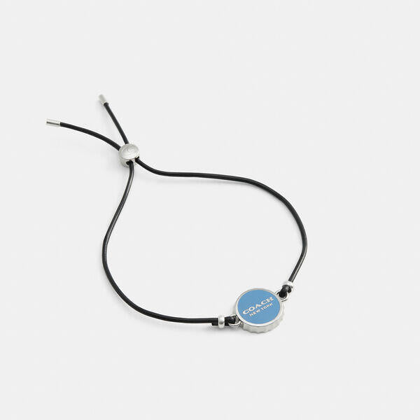 Image of Bracelets. Productname: Enamel Bottle Cap Black Leather Bracelet in SILVER/BLUE colour by brand - Coach Outlet Australia