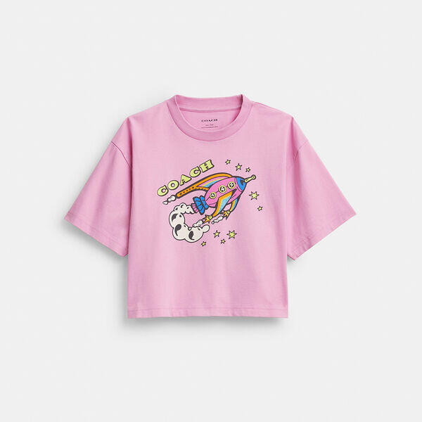 Image of a model wearing Tops. Productname: Cosmic Coach Rocket Print Cropped T-Shirt In Organic Cotton in HOT PINK colour by brand - Coach Outlet Australia