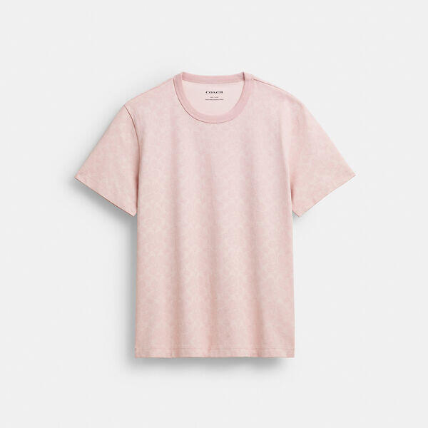 Image of a model wearing Tops. Productname: All Over Signature T-Shirt In Organic Cotton in PINK MULTI colour by brand - Coach Outlet Australia