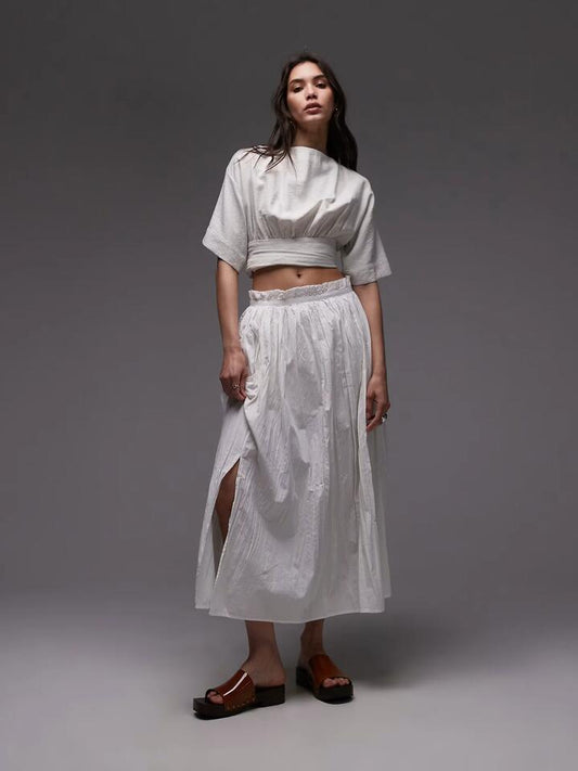 Image of a model wearing Skirts. Productname: Topshop Crinkle Cotton Laundered Full Skirt in Ivory colour by brand - Topshop