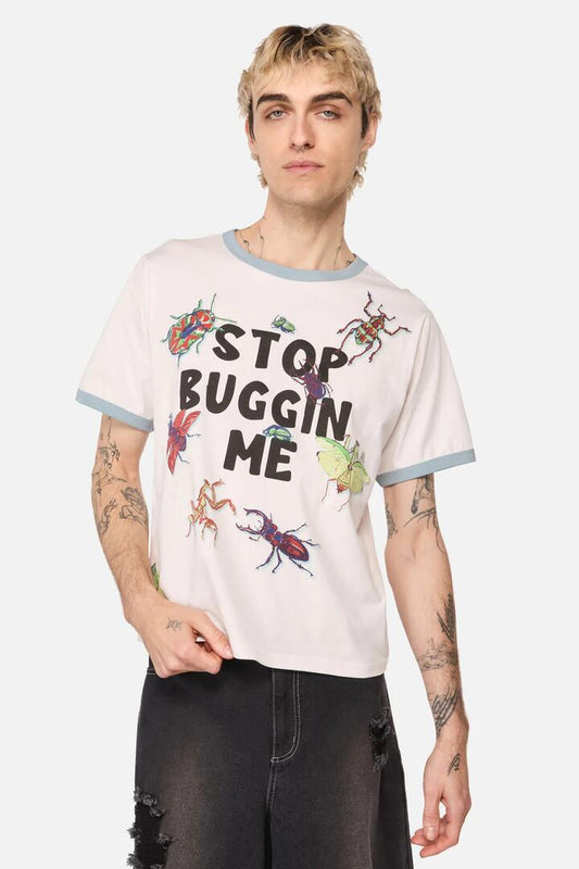 Image of a model wearing Tops. Productname: Stop Buggin Me Tee in Cream colour by brand - Dangerfield