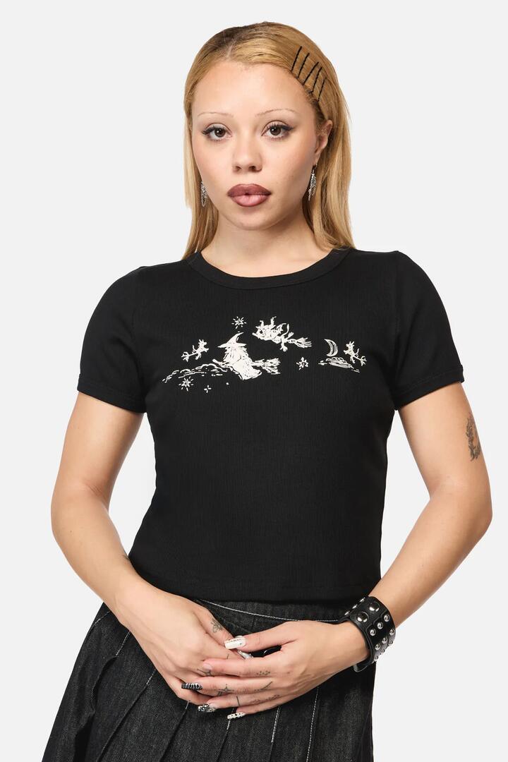 Image of a model wearing Tops. Productname: Marianne Crop Print Tee in Black colour by brand - Black Friday