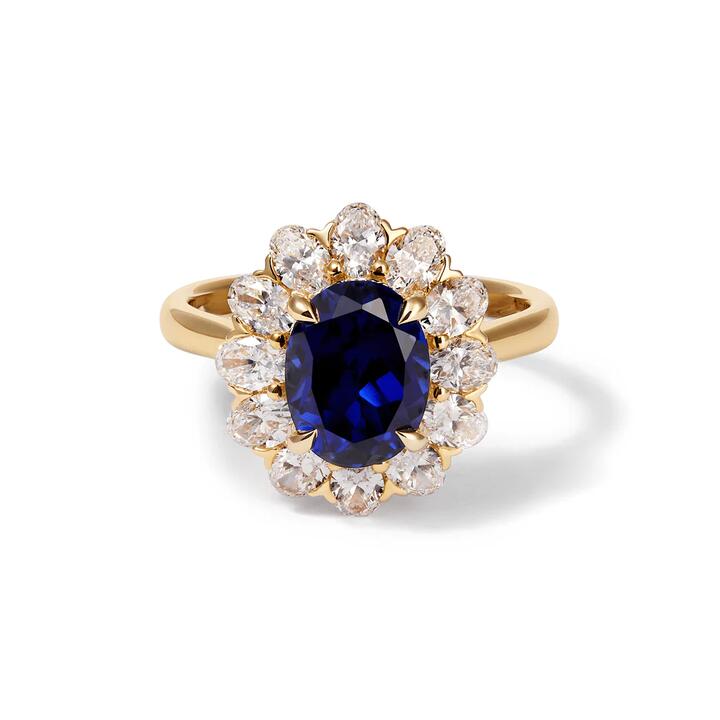 Image of Jewelry. Productname: Oval Created Sapphire Halo Ring with 1.20tw of Laboratory-Grown Diamonds in 9kt Yellow Gold in Diamond colour by brand - Bevilles