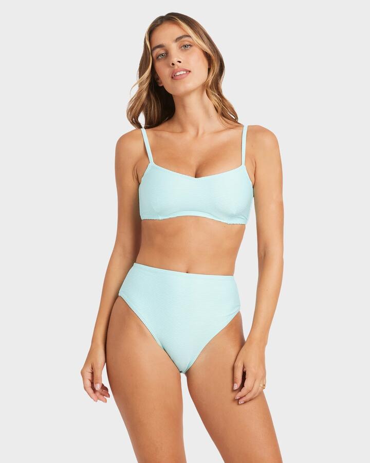 Image of a model wearing Tops. Product name - Billabong Womens Tanlines Lila D/Dd Bralette Bikini Top Crystal Blue in Crystal Blue colour by brand - Billabong