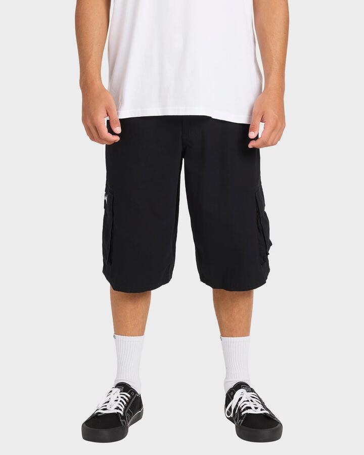 Image of a model wearing Shorts. Product name - Billabong Mens Script Cargo Shorts Black in Black colour by brand - Billabong