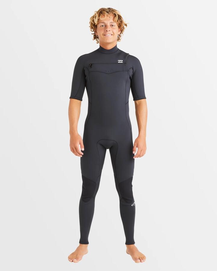 Image of a model wearing Tops. Productname: Billabong Mens 2/2Mm Absolute Natural Chest Zip Fullsuit Black - in Black colour by brand - Billabong