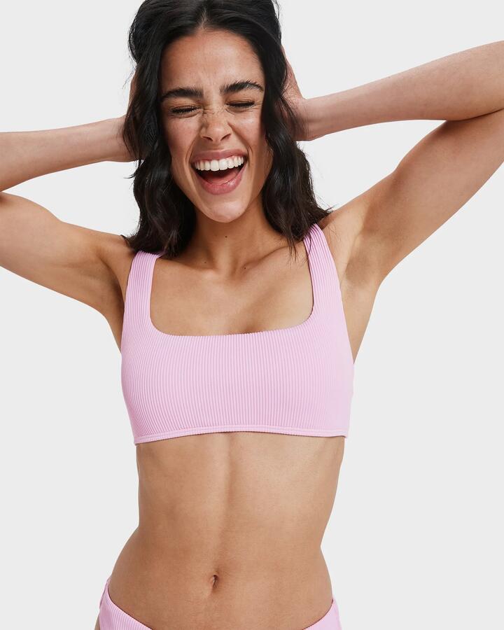 Image of a model wearing Tops. Productname: Roxy - Womens Roxy Love Bralette Bikini Top - Bonbon - in Bonbon colour by brand - Roxy