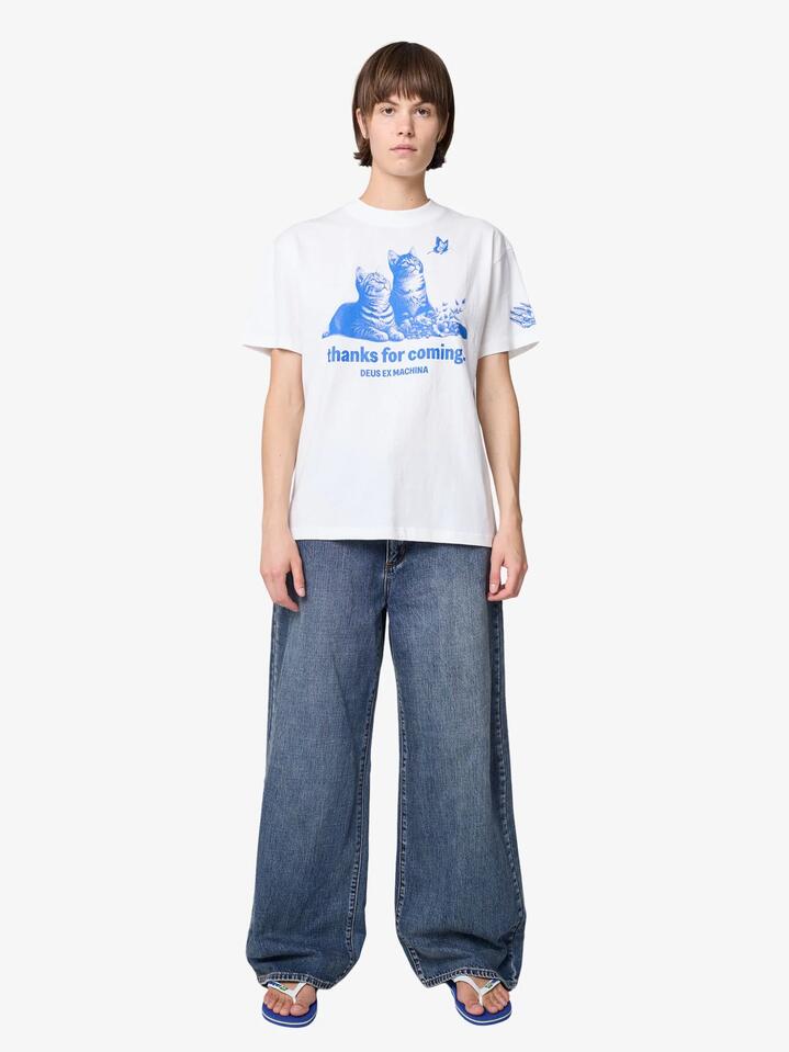 Image of a model wearing Tops. Productname: Deus Ostinato Tee in Blue Print/Vintage White colour by brand - Deus