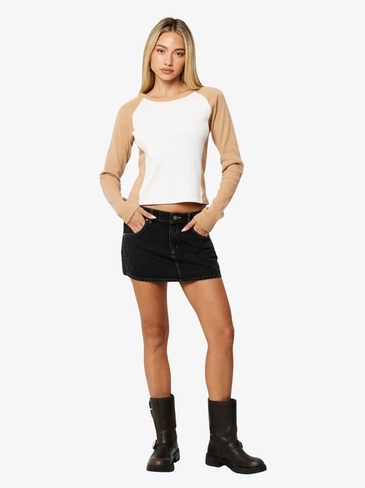 Image of a model wearing Skirts. Productname: Abrand 99 Low Skirt Cara in Washed Black colour by brand - Abrand
