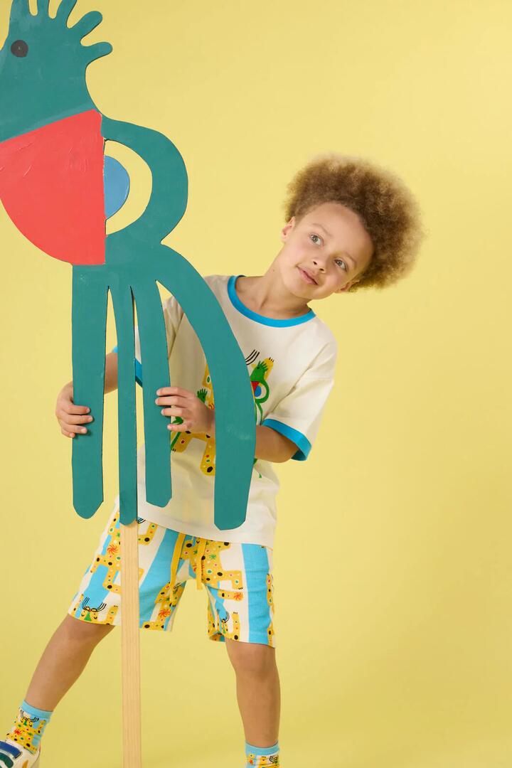 Image of a model wearing Shorts. Product name - Rio Stripe Kids Shorts in Multi colour by brand - Gorman