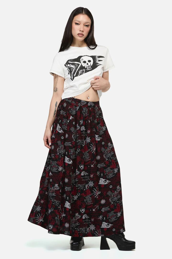 Image of a model wearing Skirts. Product name - Pirate Punk Midi Skirt in Black colour by brand - Dangerfield