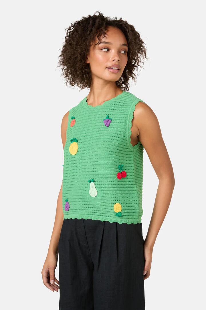 Image of a model wearing Tops. Product name - Fruit Party Cotton Knit Tank in Green colour by brand - Gorman