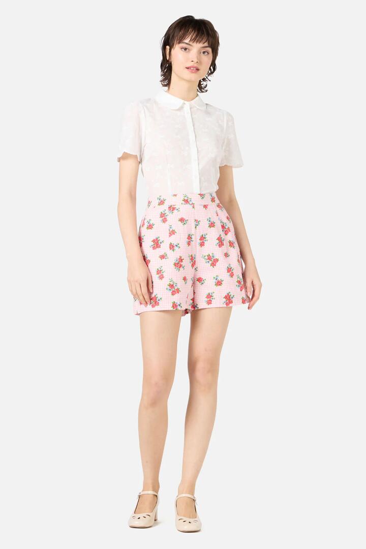Image of a model wearing Shorts. Productname: Gingham Floral Shorts in Pink colour by brand - Princess Highway