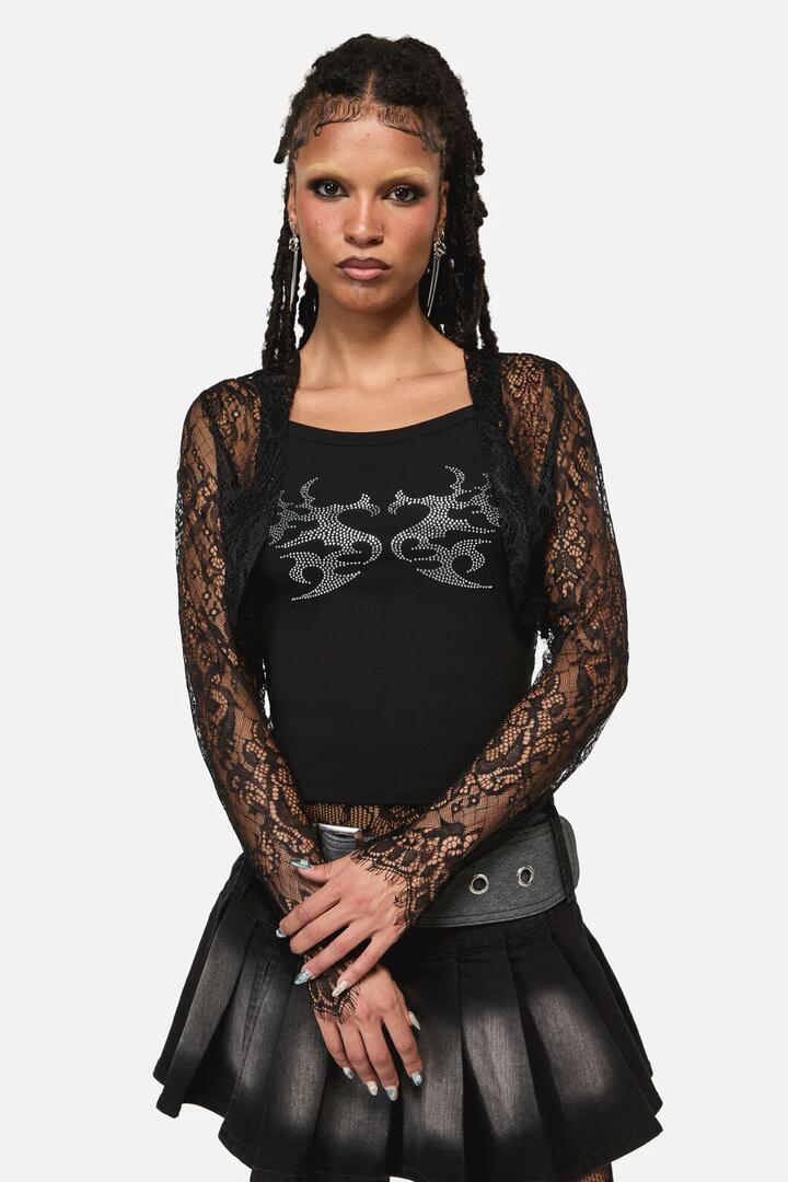 Image of a model wearing Tops. Product name - Ellen Lace Goth Sleeve Top in Black colour by brand - Black Friday