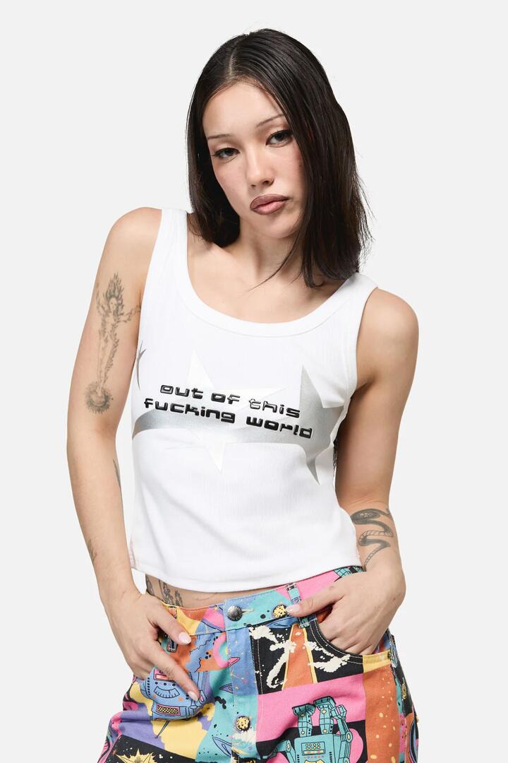 Image of a model wearing Tops. Product name - Galactic Print Tank Top in Cream colour by brand - Dangerfield