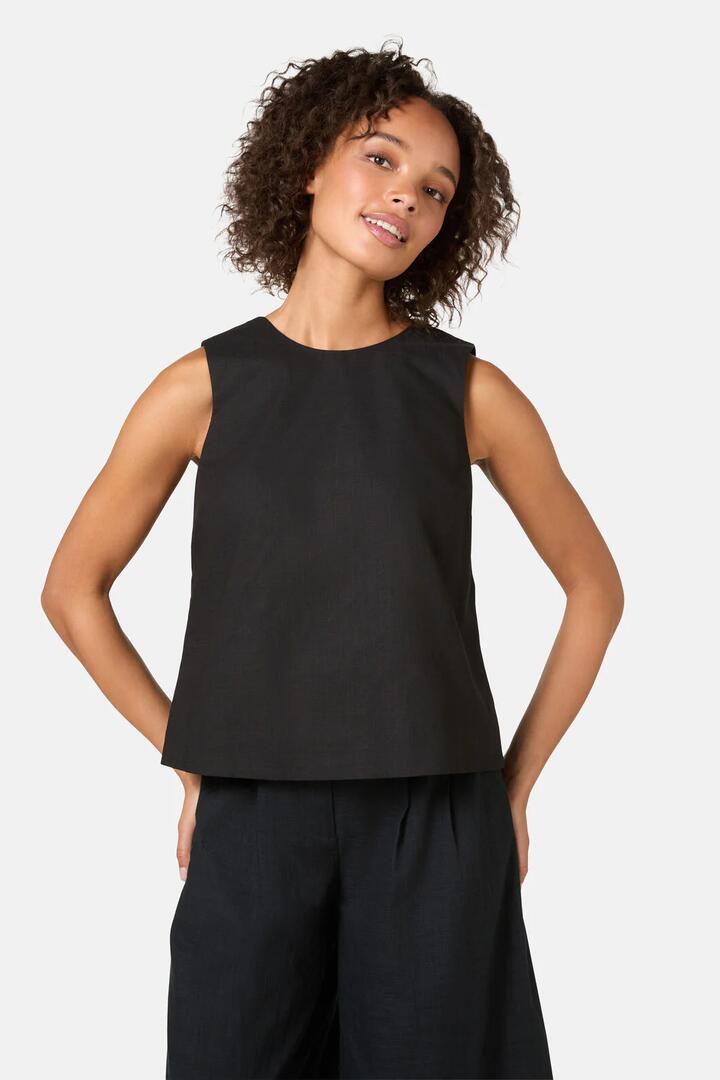 Image of a model wearing Tops. Product name - Lucy Cotton Tie Tank in Red colour by brand - Gorman