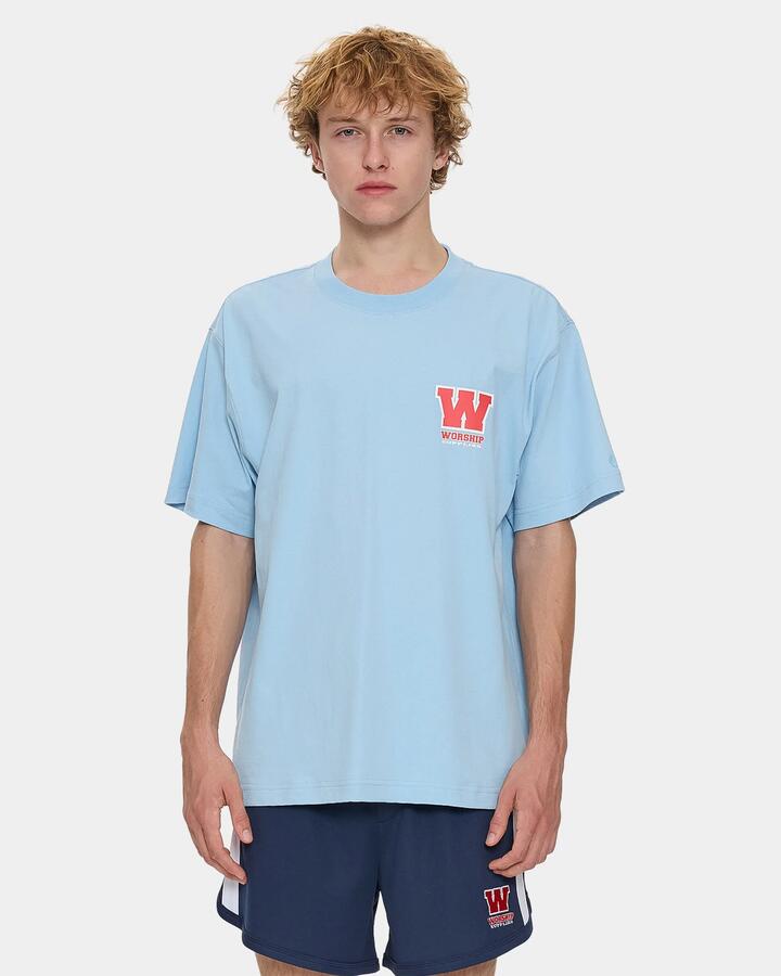 Image of a model wearing Tops. Productname: worship Mens Little Better T-Shirt Blue - in Blue colour by brand - Worship