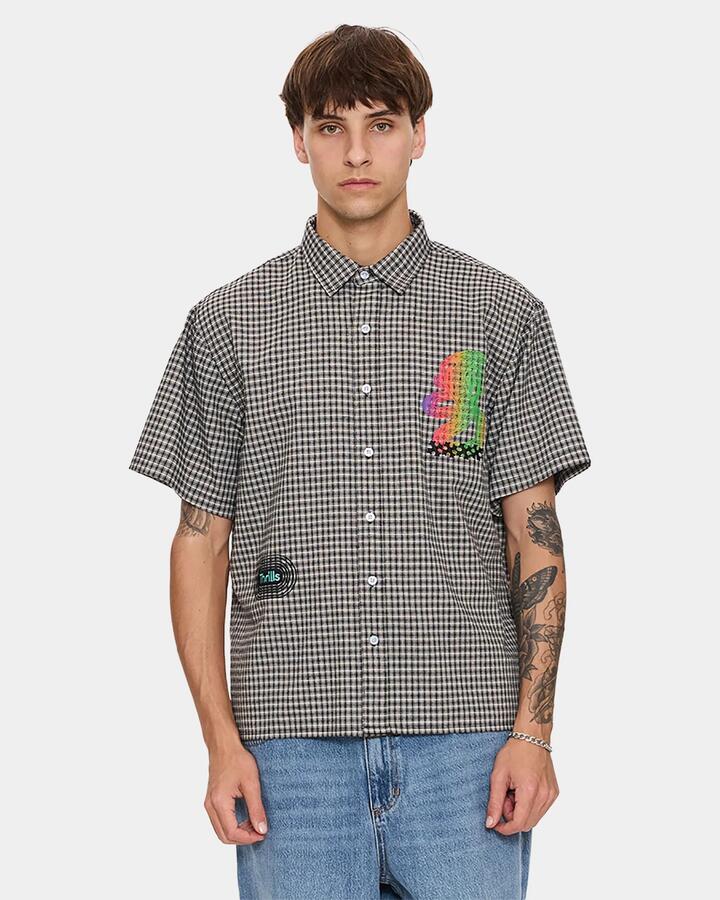 Image of a model wearing Tops. Productname: thrills - Mens It'S In The Cards Short Sleeve Shirt - Black - in Black colour by brand - thrills