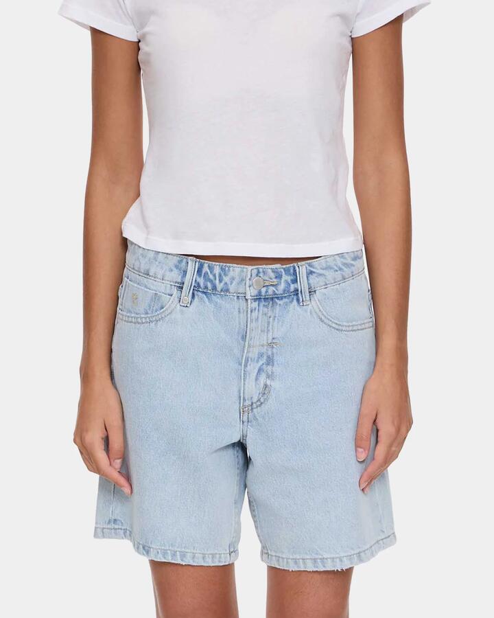 Image of a model wearing Shorts. Productname: thrills - Womens Billie Low Rise Baggy Denim Shorts - Serenity Blue - in Serenity Blue colour by brand - thrills