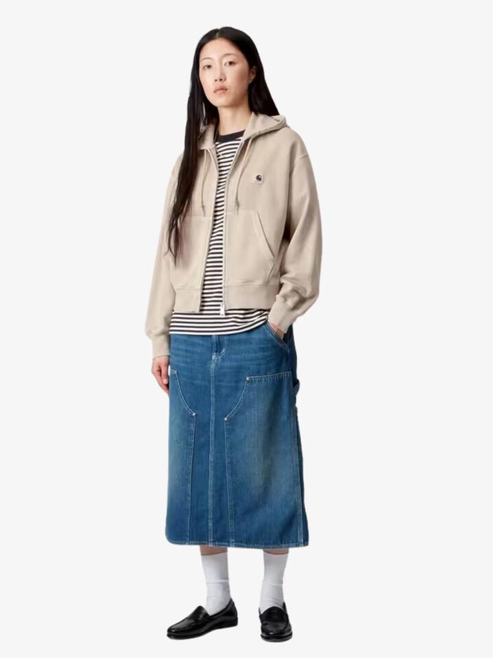 Image of a model wearing Outerwear. Productname: Carhartt Wip Womenâs Hooded Nelson Jacket in Fleur De Sel Garment Dyed colour by brand - Carhartt Wip