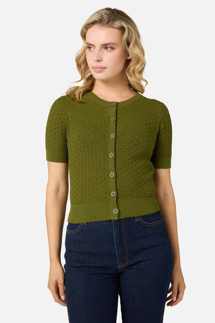 Image of a model wearing Tops. Productname: Garden Short Sleeve Cardigan in Olive colour by brand - Princess Highway