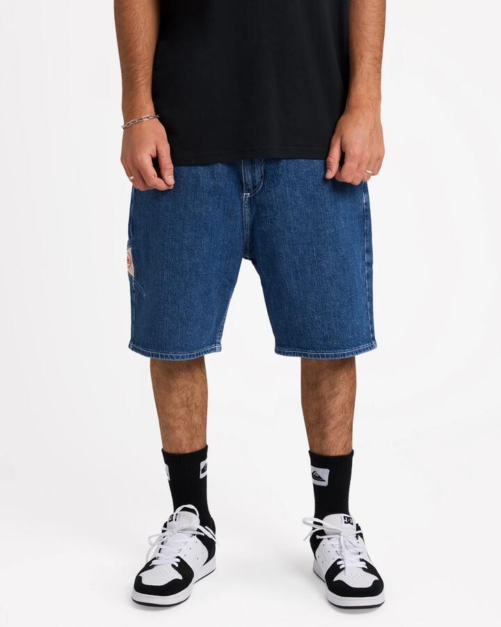 Image of a model wearing Shorts. Product name - Quiksilver Mens Legacy Denim Shorts Denim in Denim colour by brand - Quiksilver