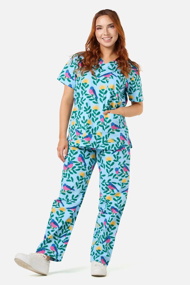 Image of a model wearing Uniforms & Workwear. Productname: Pink Robin Scrub Set in Blue colour by brand - Scrubs With Love