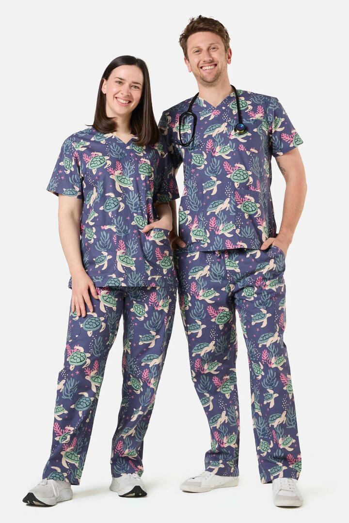 Image of a model wearing Uniforms & Workwear. Productname: Sea Turtle Scrub Set in Blue colour by brand - Scrubs With Love