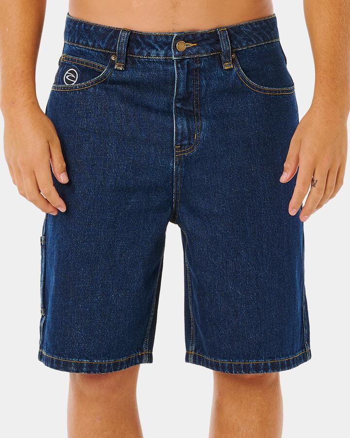 Image of a model wearing Shorts. Product name - Rip Curl Mens Nu Dose Denim Shorts Indigo in Indigo colour by brand - Rip Curl