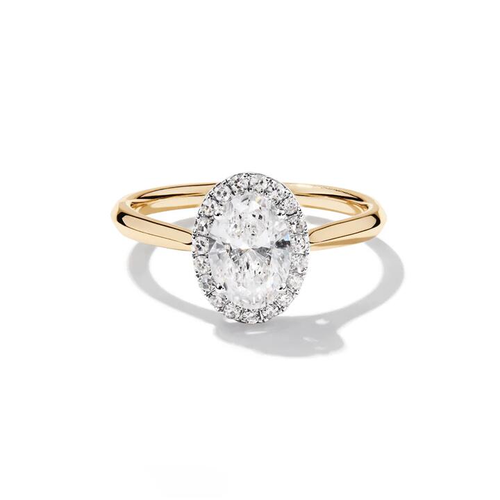 Image of Jewelry. Productname: Oval Halo Ring with 1.10tw of Laboratory-Grown Diamonds in 9kt Yellow Gold in Diamond colour by brand - Bevilles