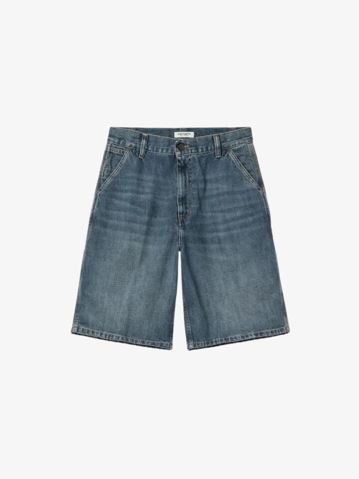 Image of a model wearing Shorts. Productname: Carhartt Wip Women's Brandon Single Knee Shorts in Blue Dark Wash colour by brand - Carhartt Wip