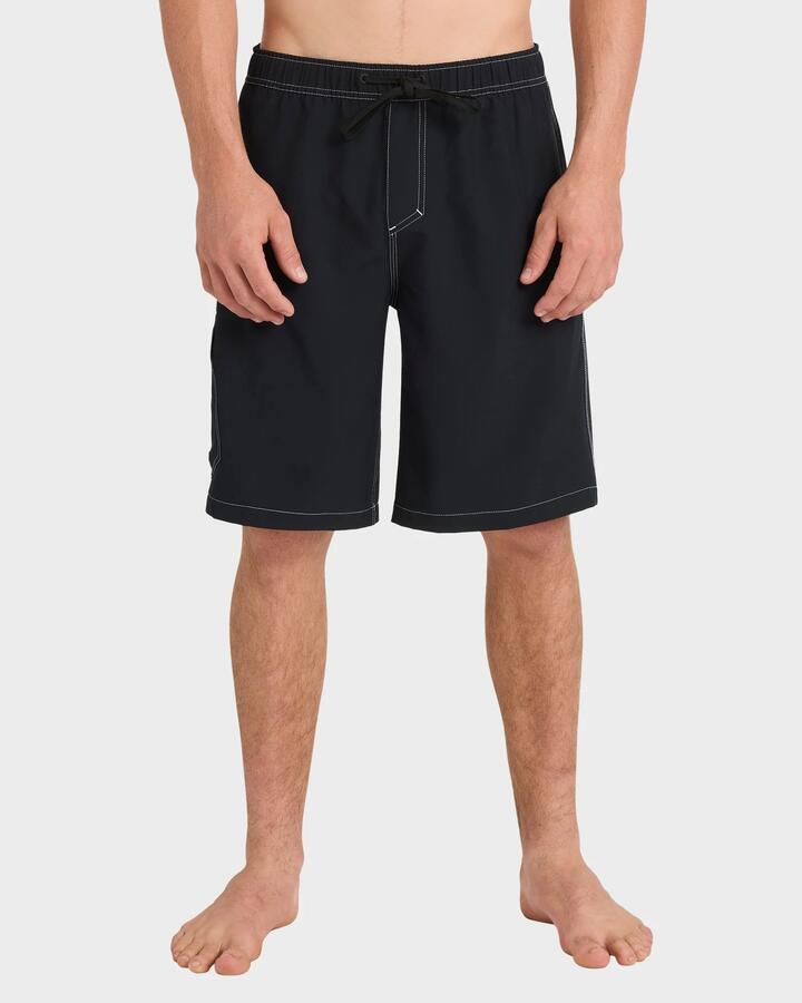 Image of a model wearing Shorts. Product name - Quiksilver Mens Exhibit Volley 21" Swim Shorts Black in Black colour by brand - Quiksilver