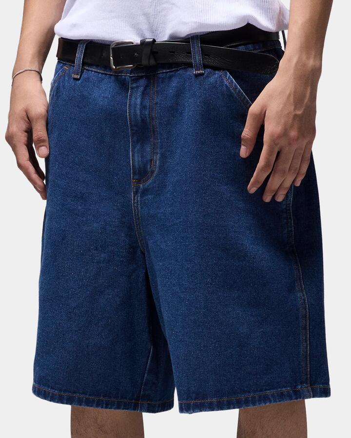 Image of a model wearing Shorts. Productname: former - Mens Reynold Proscription 21" Denim Shorts - Dark Blue - in Dark Blue colour by brand - former