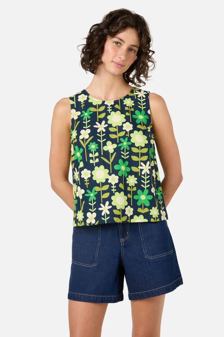 Image of a model wearing Tops. Productname: Penny 60's Shell Top in Navy colour by brand - Princess Highway