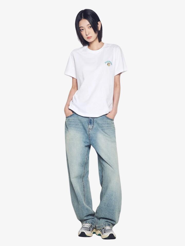 Image of a model wearing Tops. Productname: ADLV Women's Mini Ac Bear T-Shirt in White colour by brand - ADLV