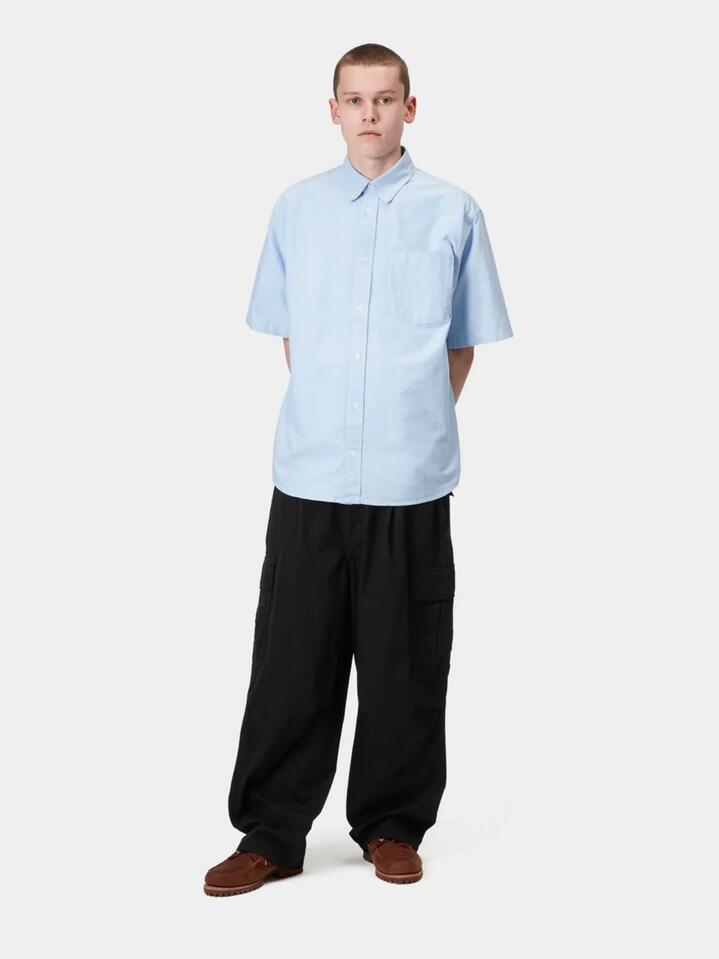 Image of a model wearing Pants. Productname: Carhartt Wip Cole Cargo Pant in Black colour by brand - Carhartt Wip