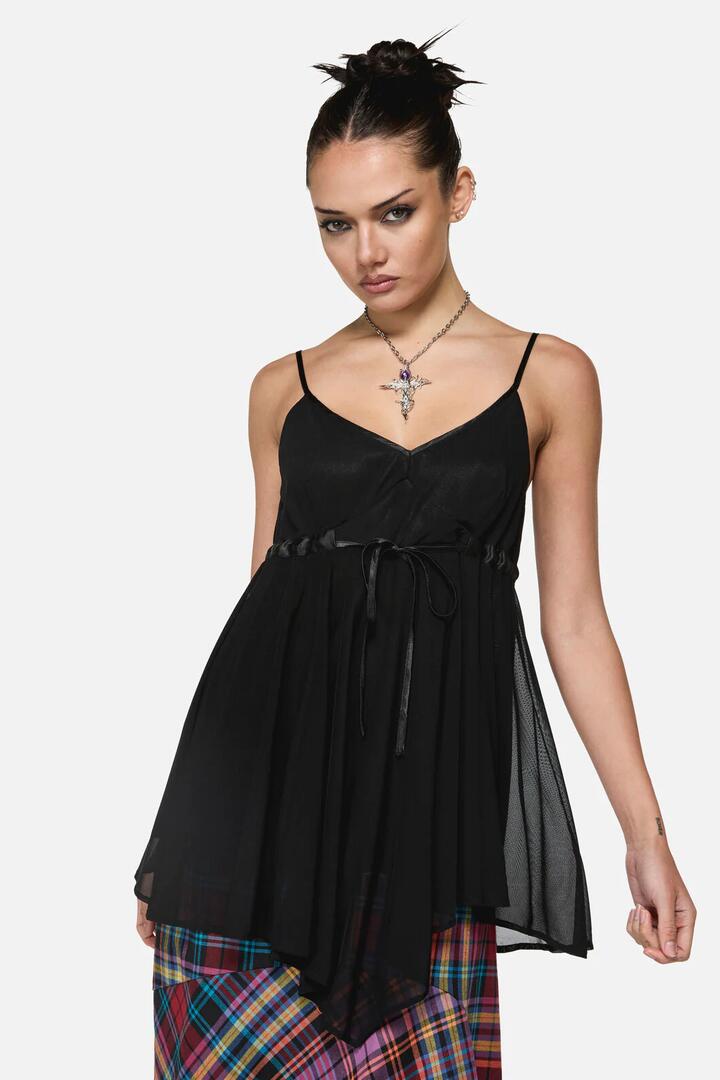 Image of a model wearing Tops. Product name - Fairy Dust Whimsical Top in Black colour by brand - Black Friday