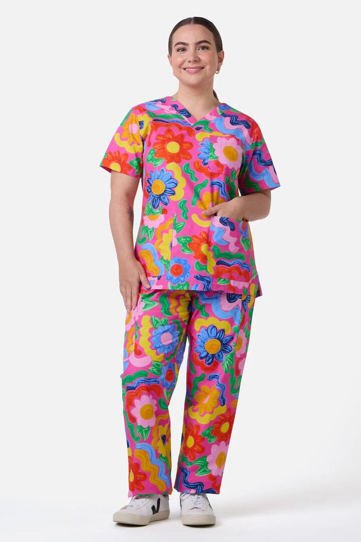 Image of a model wearing Uniforms & Workwear. Productname: Ribbon Floral Scrub Set in Multi colour by brand - Gorman