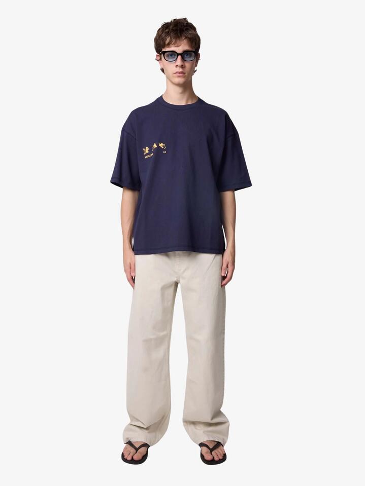 Image of a model wearing Tops. Productname: Article One Shadow Tee in NAVY colour by brand - Article One
