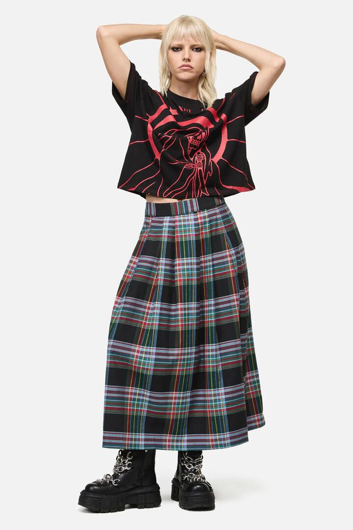 Image of a model wearing Skirts. Product name - Hermit Goth Tartan Midi Skirt in Multi colour by brand - Dangerfield