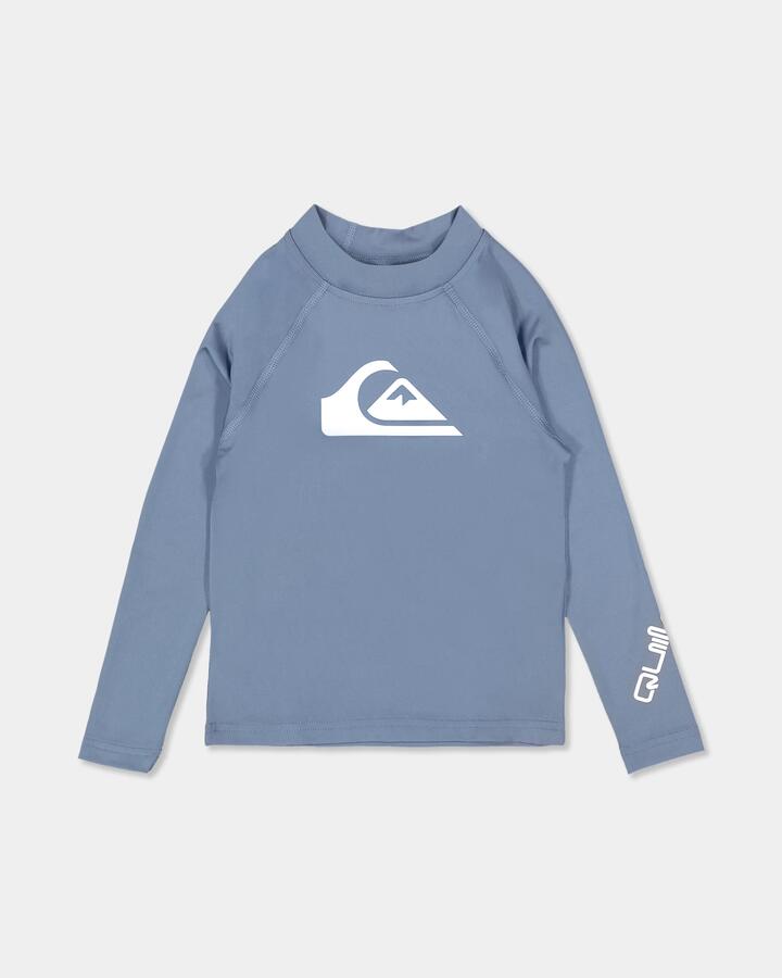 Image of a model wearing Tops. Product name - Quiksilver Boys 2-7 All Time Long Sleeve Rash Vest China Blue in China Blue colour by brand - Quiksilver