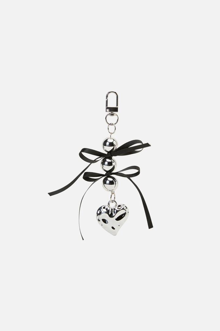 Image of Charms. Productname: Bow & Heart Charm in Silver colour by brand - Black Friday