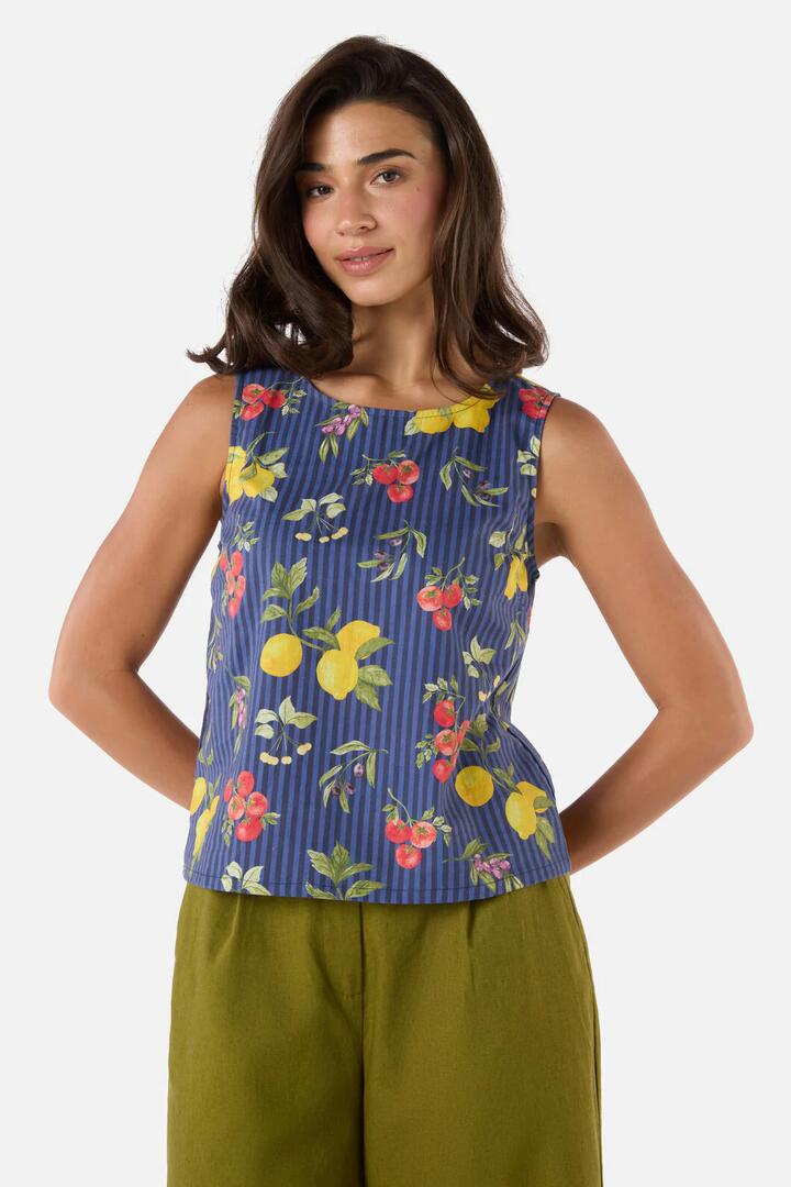 Image of a model wearing Tops. Product name - Carla Picnic Shell Top in Navy colour by brand - Princess Highway