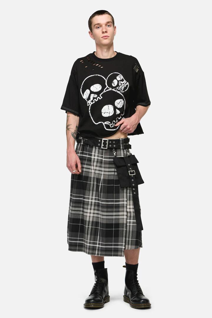 Image of a model wearing Skirts. Product name - Lovett Tartan Grunge Kilt in Grey colour by brand - Black Friday