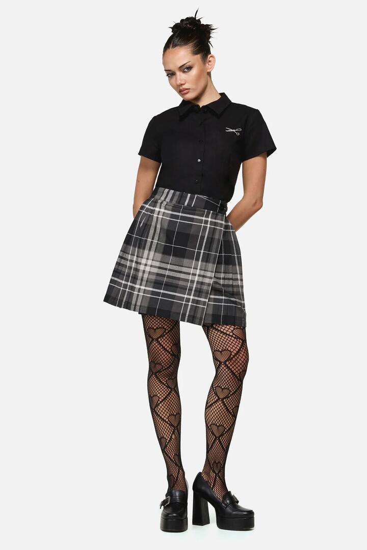 Image of a model wearing Skirts. Product name - Lovett Goth Tartan Mini Skirt in Grey colour by brand - Black Friday