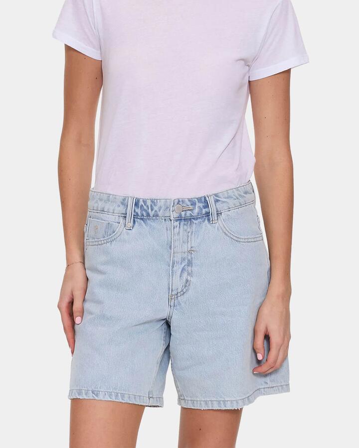 Image of a model wearing Shorts. Product name - Thrills Womens Billie Low Rise Baggy Embro Denim Shorts Ash Black in Ash Black colour by brand - Thrills